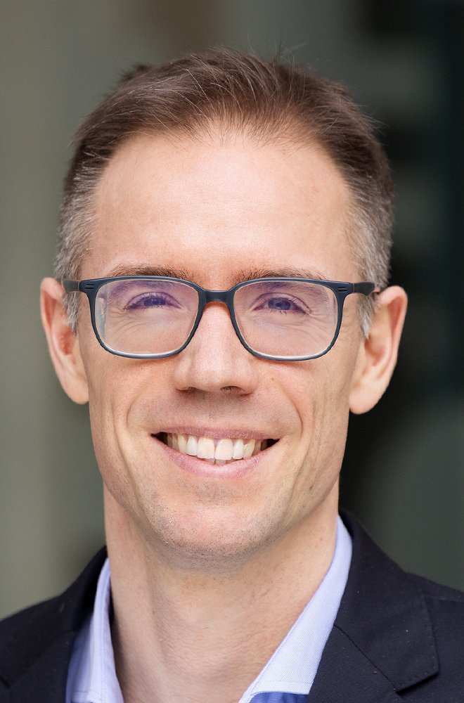 Porträtfoto von Christopher Klein