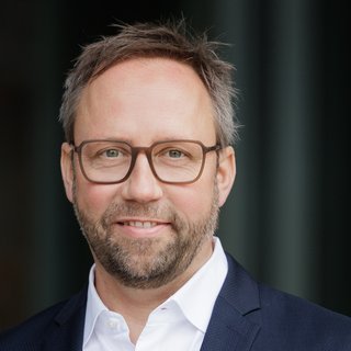 Portraitfoto von Thomas Minich