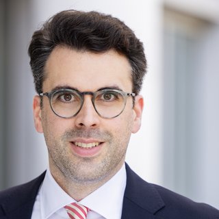 Portraitfoto von Dr. Timur Erim